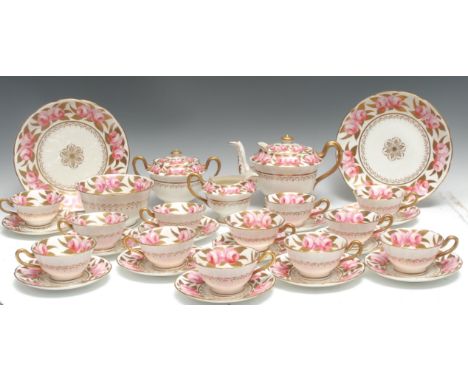 A Spode tea service , for twelve, comprising teapot, sucrier and cover, milk jug, slop bowl, two plates, cups and saucers, de