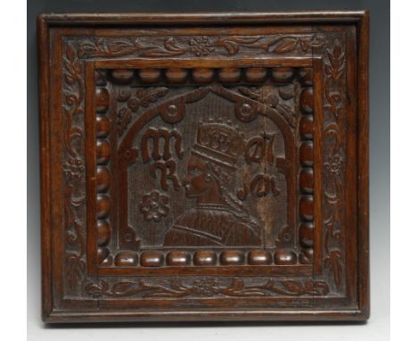 A post-Medieval oak panel, carved in relief with a portrait Mary I, depicted in profile within an architectural niche, flanke