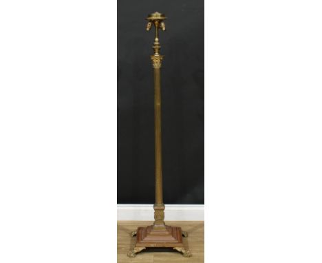 A brass floor-standing telescopic lamp, Corinthian column, stepped square base, paw feet, 146cm extending to 209cm high overa