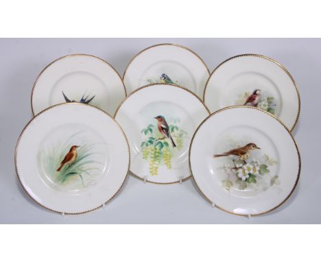A Royal Worcester plate, painted by W. Powell, signed, with a Chaffinch, gilt dentil rim, 15cm diam, printed mark in blue;  o