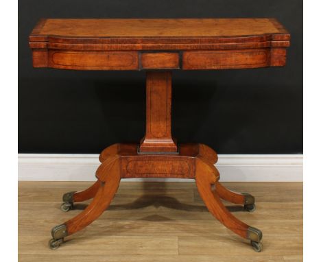 A Post-Regency oak card table, rosewood crossbanded top enclosing a baize lined playing surface, spreading rectangular column