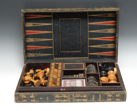 A 19th century games compendium, comprising boxwood and ebony chess pieces, draughts, dominoes, cribbage board, in morocco le