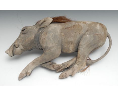 Modern School, a ceramic sculpture, of a juvenile warthog, hair mane,  41cm long 