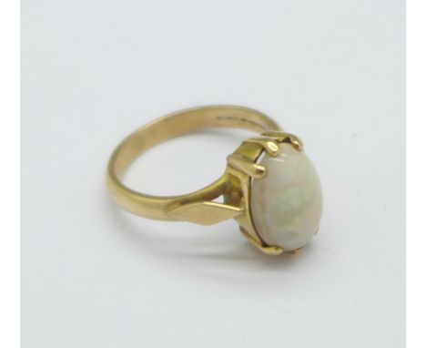 A 9ct gold and fire opal ring, 3.9g, O