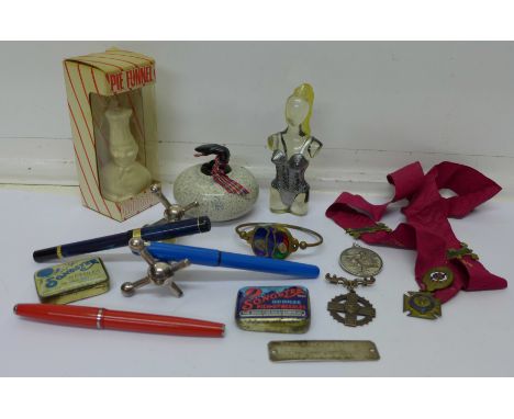 Two swimming medals, a R.A.O.B. sash, a gilt metal and enamel arts and crafts bangle, etc.