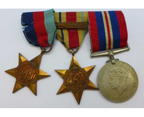 A set of three WWII medals, The Africa Star with 1st Army bar