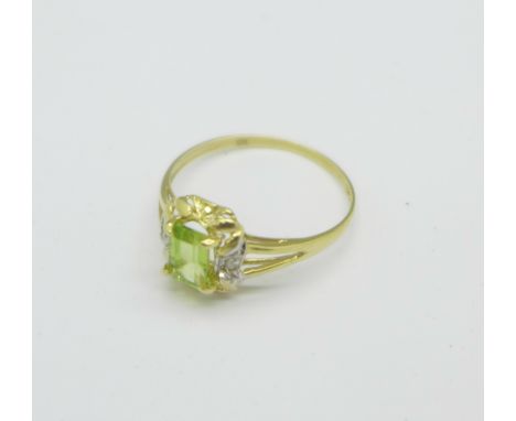 A 9ct gold, peridot and diamond ring, 1g, O