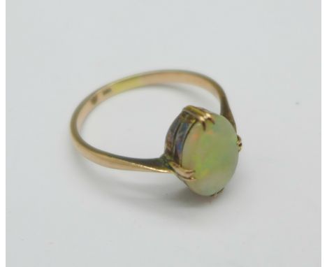 A 9ct gold and opal ring, 2g, Q