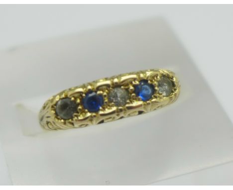 A 9ct gold and five stone ring, 2.1g, M