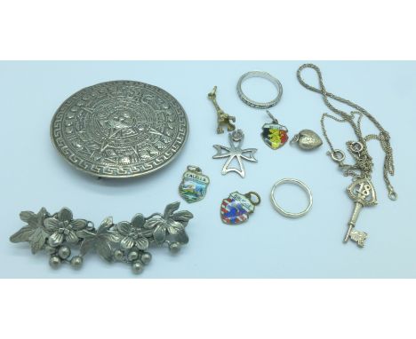 Two brooches, an eternity ring, a pendant and chain and charms