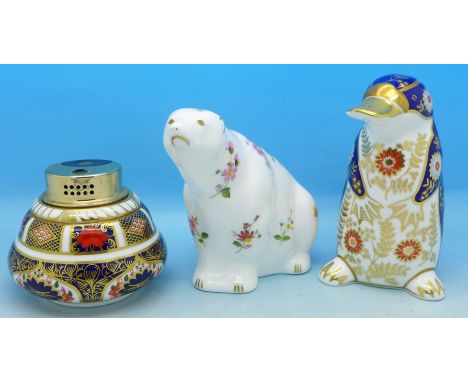 Two Royal Crown Derby paperweights, Polar Bear and Platypus and an Old Imari table lighter, paperweights seconds