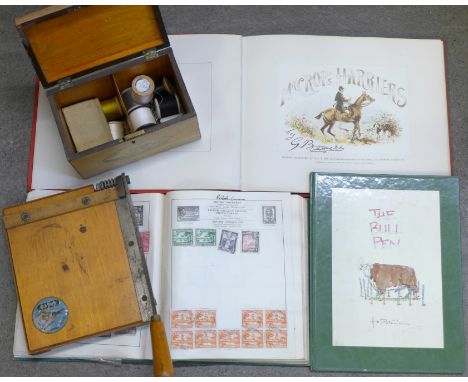 A stamp album, two books, The Bull Pen by N. Patterson and Mr Crop's Harriers, small guillotine and tea caddy with cottons