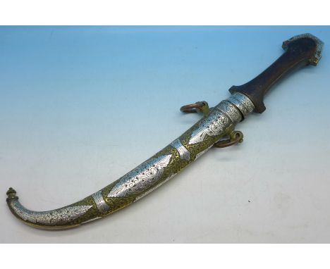 An Eastern dagger with scabbard