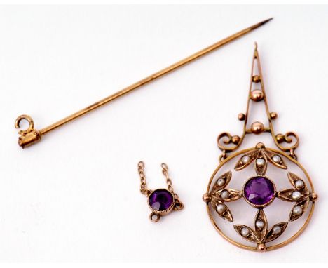 Edwardian amethyst and seed pearl open work pendant with central millegrain set amethyst with four seed pearl leaf surround s