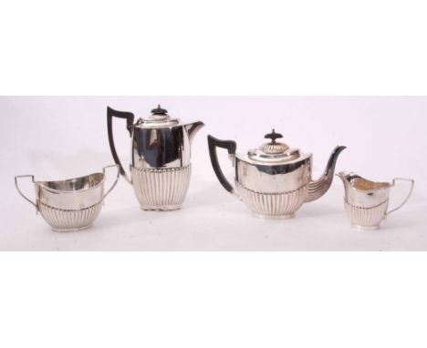 Early 20th century electro plated four piece tea set comprising hot water pot, tea pot, sugar basin and milk jug, each of ova