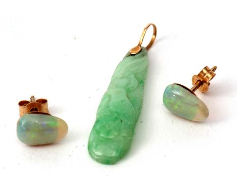 Mixed Lot: carved jade pendant on a 14K stamped bale, 4cm long, together with a pair of opal stud earrings applied to yellow 