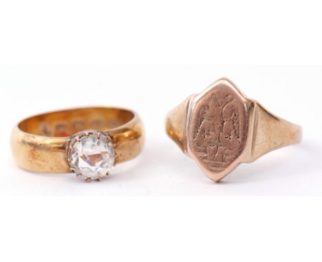 Mixed Lot: 22ct gold wedding ring, applied with a paste stone, size M/N, together with a yellow metal signet ring, the shield