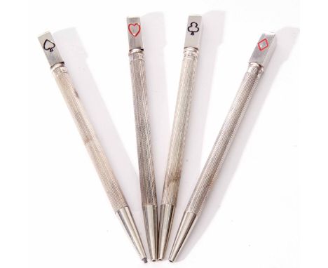 Cased set of four white metal Bridge pencils, each of engine turned cylindrical form and each bearing a playing card suit, st