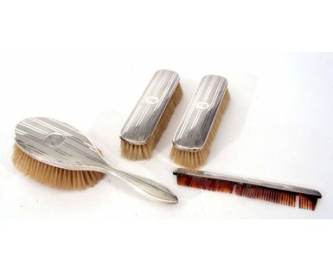 Part silver backed dressing table set comprising hand brush, pair of clothes brushes and silver backed comb (4)