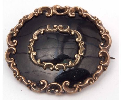 Large Victorian gold filled and black enamel mourning brooch, 5 x 4cm with a vacant panel verso