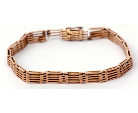 A 15ct stamped five-bar gate bracelet, 20mm long, 15.2gms (damaged)