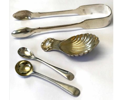Mixed Lot: comprising a pair of Fiddle pattern sugar tongs, silver gilt shell formed caddy spoon, two various salt spoons var