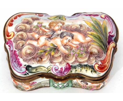 Continental porcelain and brass mounted snuff box of serpentine form, the hinged cover set with putti amongst clouds within a