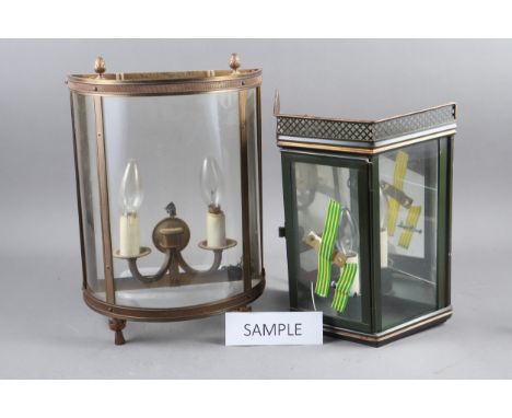 A pair of green and gilt metal framed glass fronted wall lights, 12 1/4" high, and another pair of bowfront glass and gilt me