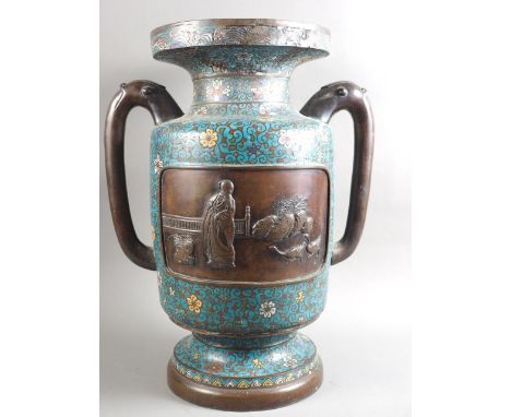 A Chinese cloisonne enamel two-handle vase with figure and bird decorated panels, 18" high (some damage to enamel on rim) 