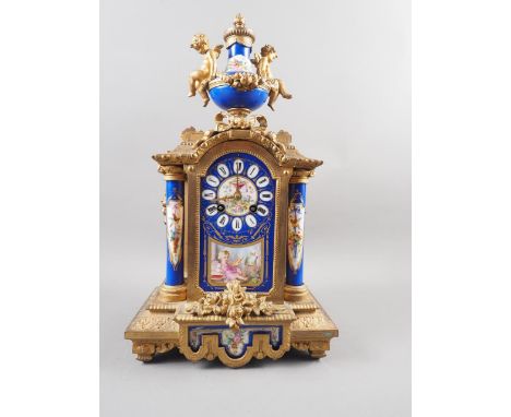 A 19th century French porcelain and gilt metal mounted mantel clock with eight-day movement and cherub decoration, 17 1/4" hi