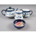 A late 19th century Macintyre three-piece teaset, comprising a teapot, a sugar basin and a cream