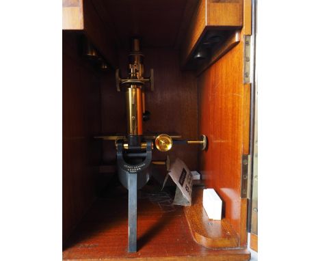 A Henry Crouch of London portable microscope, in case, 13 1/2" overall 