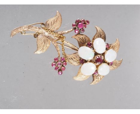 A yellow metal floral brooch, set opal and ruby, 9.4g 