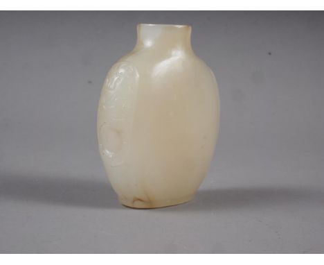 A Chinese pale jade snuff bottle with carved decoration (no top) 2 1/2" high 