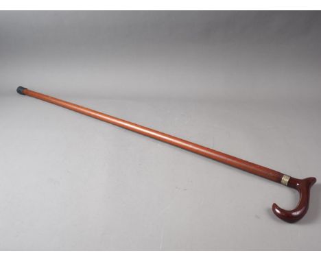 A walking stick with red Bakelite handle, 36 1/4" long 