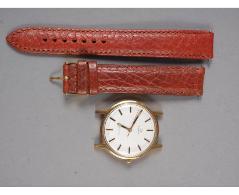 A gentleman's Omega Geneve manual wind wristwatch with silvered dial and baton numerals, with faux crocodile leather strapCon