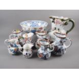 Five Masons Ironstone china jugs, in graduated sizes, three other similar jugs, largest 10 1/2"