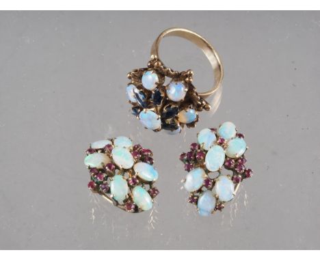 An 18ct gold opal and sapphire cocktail ring, size M, 6.2g, and a similar pair of earrings, 5.8g 