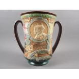A Royal Doulton George IV and Elizabeth 1937 Coronation loving cup, signed Noke, 10 1/4" high