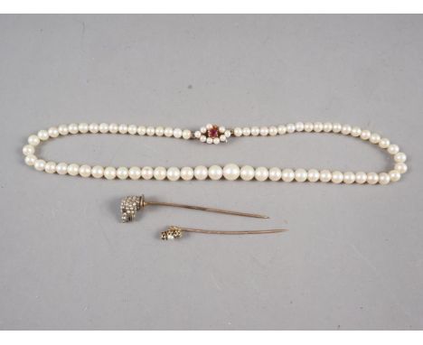 A single strand pearl necklace with 9ct gold clasp set pearls and a ruby (one pearl missing on clasp), 15 1/2" long overall, 