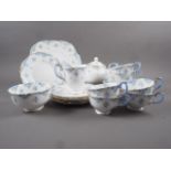 A Crown Staffordshire blue and pink floral decorated teaset for six