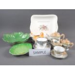 A doll's Japanese porcelain part tea service, two pieces of Carlton leaf ware, a Delphine China