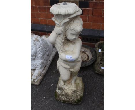 A garden bird bath top, the base depicting a putto supporting cornucopia on a plinth base 