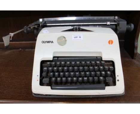 An Olympia branded manual typewriter 