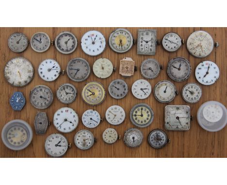 Collection of 37 Watch Movements &amp; Faces inc Trojan, Cyma &amp; Lunesa. Watch movements inc Trojan, Accurist, Titan, Texa