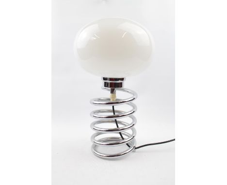 Ingo Maurer German "Spring" lamp from the 60s/70s. Spiral base in chromed steel surmounted by a flattened globe in white opal