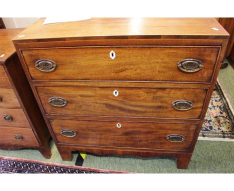 Georgian Inlaid Mahogany chest of 3 drawers with oval brass drop handles on bracket feet 