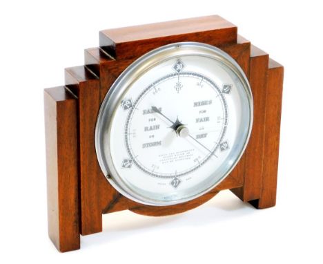 A mid 20thC Art Deco design barometer, with 17cm diameter chrome plated dial in a stepped case, 23cm high. 