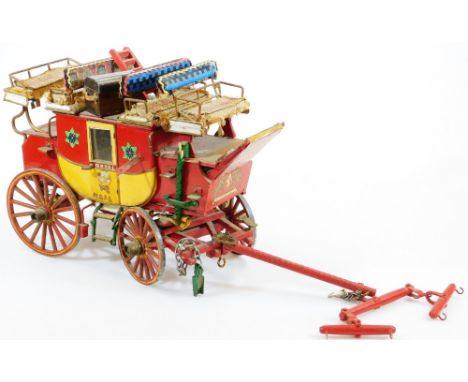 A scratch built model of a Royal Mail coach, with removable items including a step ladder and travel trunk, partially painted