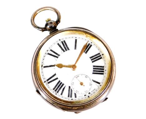 An early 20thC open faced pocket watch, with 4.5cm Roman numeric dial with subsidiary Arabic second hand, in engine turned ca